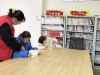 成都市新都区新繁街道清镇村关工委组织志愿者开展读书辅导志愿服务活动