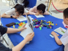 成都市新都区新繁街道同裕村关工委组织少年儿童参加益智游戏闯关活动